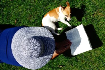 person reading with dog