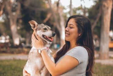 Girl petting dog